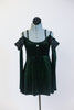 Green, sparkle velvet, off the shoulder, tunic dress has crystals, long sleeves & black chiffon draping at the shoulder. Comes with black floral hair accessory. Front