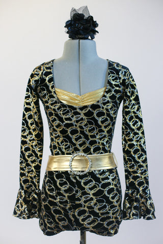Sparkling gold rings cover a black velvet base unitard. Long sleeves have flared wrists & wide gold belt with crystal buckle & gold bra. Comes with headpiece. Front zoom