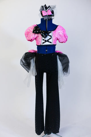 Pink half top with large black crystal bow accent .Comes with  black pant with black and white tulle bustle & large pink bow accents. Matching  hair accessory. Front