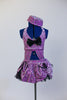 Lavender glitter velvet half-top is attached  to a black petticoat skirt & panty with matching purple overlay. Large black bow at front & matching pill hat. Front