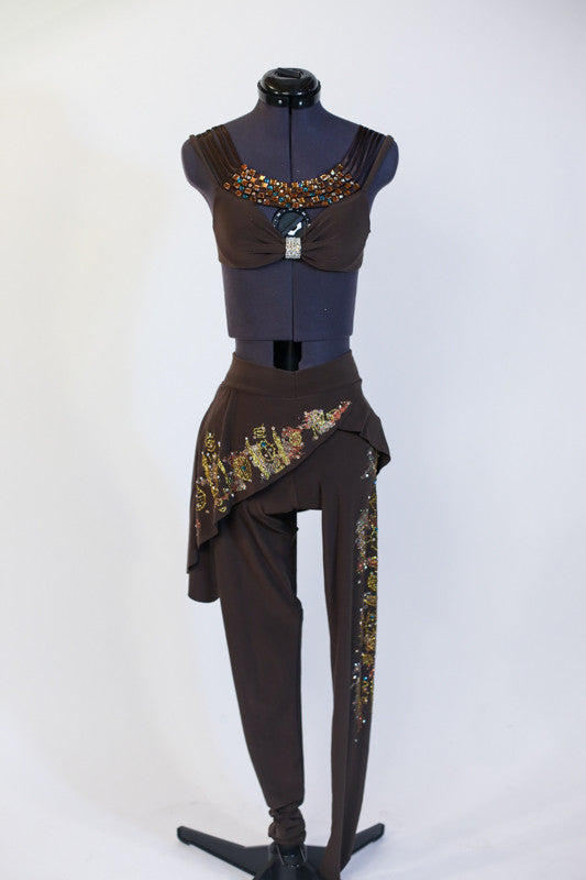 Brown two-piece bra-top with Egyptian style neck embellishment. Comes with matching leggings/ angled half-skirt.  Hand painted hieroglyphics on leg and skirt. Front