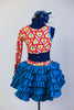Open front, leotard has rainbow heart pattern& sequined bandeau top. Has attached ruffled teal open-front skirt covered with crystals and a matching hair piece. Back