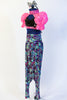 Black sequined half-top with neon pink high collar,pouff sleeves & open back with blackcorset ties. Comes with neon hip-hop harem pant & silver bow headband. Side