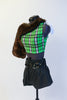 Green tartan print half top comes with a one sleeved fur shrug with white satin sash to tie shrug. Comes with black leathery shorts & wide black belt. Side