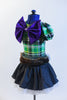 Green tartan print leotard with  large purple metallic bow comes with black taffeta skirt with layered white petticoat & a fur belt with white ribbon sash. Side