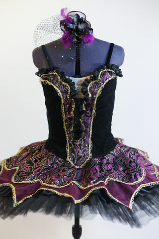  Black platter tutu & separate bodice/overlay is purple,black & gold brocade with gold trim. Bodice is black velvet with matching brocade & ruffle insert. Front zoom