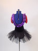 Black velvet &,red sequin leotard with purple circles and pouf sleeves. Purple ruffle around the collar & low back.Has black tutu skirt & hair accessory. Back